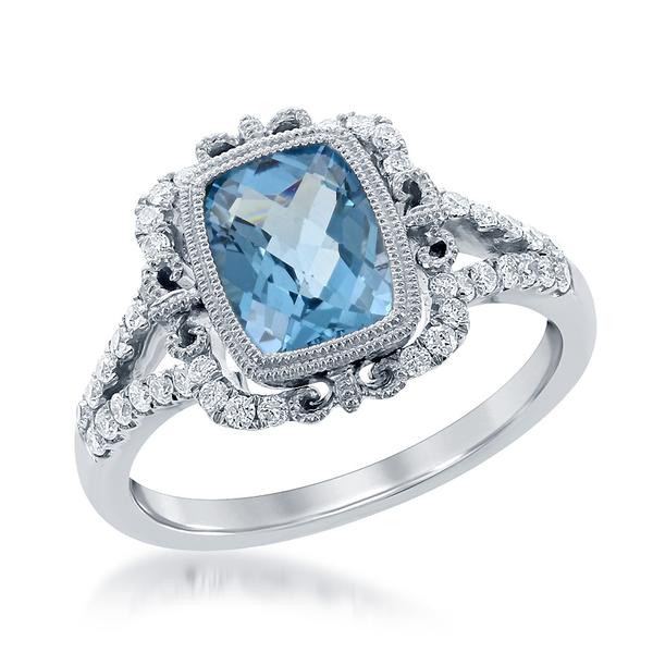 View 14Kw or y/14kr Gold Blue Topaz Ring