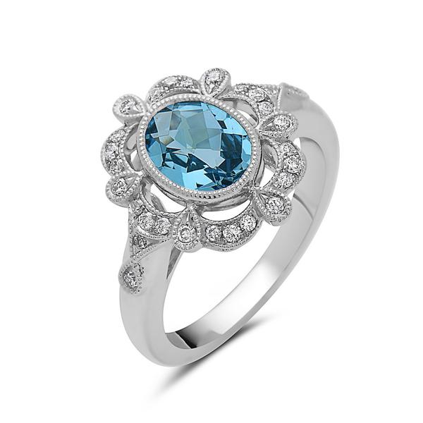 View 14Kw or y/14kr Gold Blue Topaz Ring