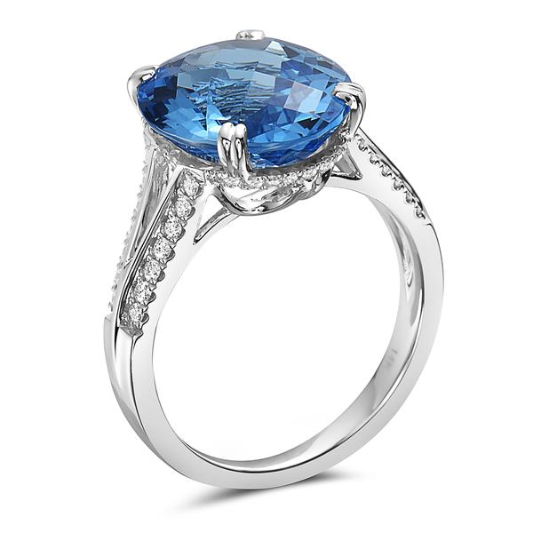 View 14Kw or y/14kr Gold Blue Topaz Ring